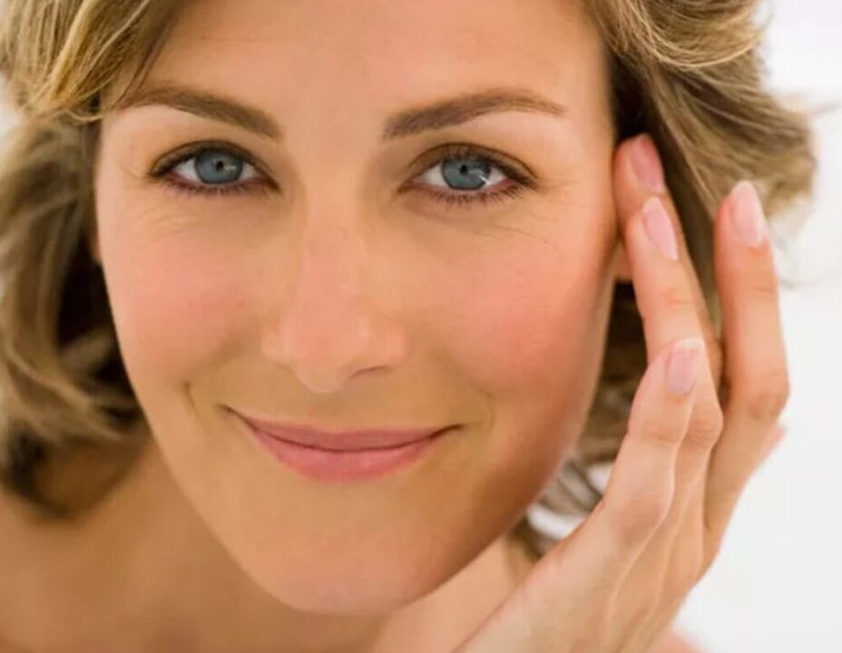 a beautiful woman rejuvenates facial skin